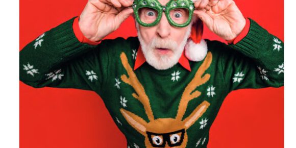 eyemax winter Mann mit kreativer Weihnachtsbrille und Ugly Pullover